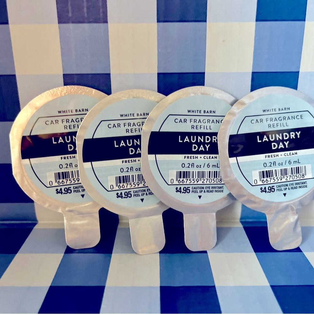 4 pack of brand new Bath and Body Works Laundry Day car fragrance refills.